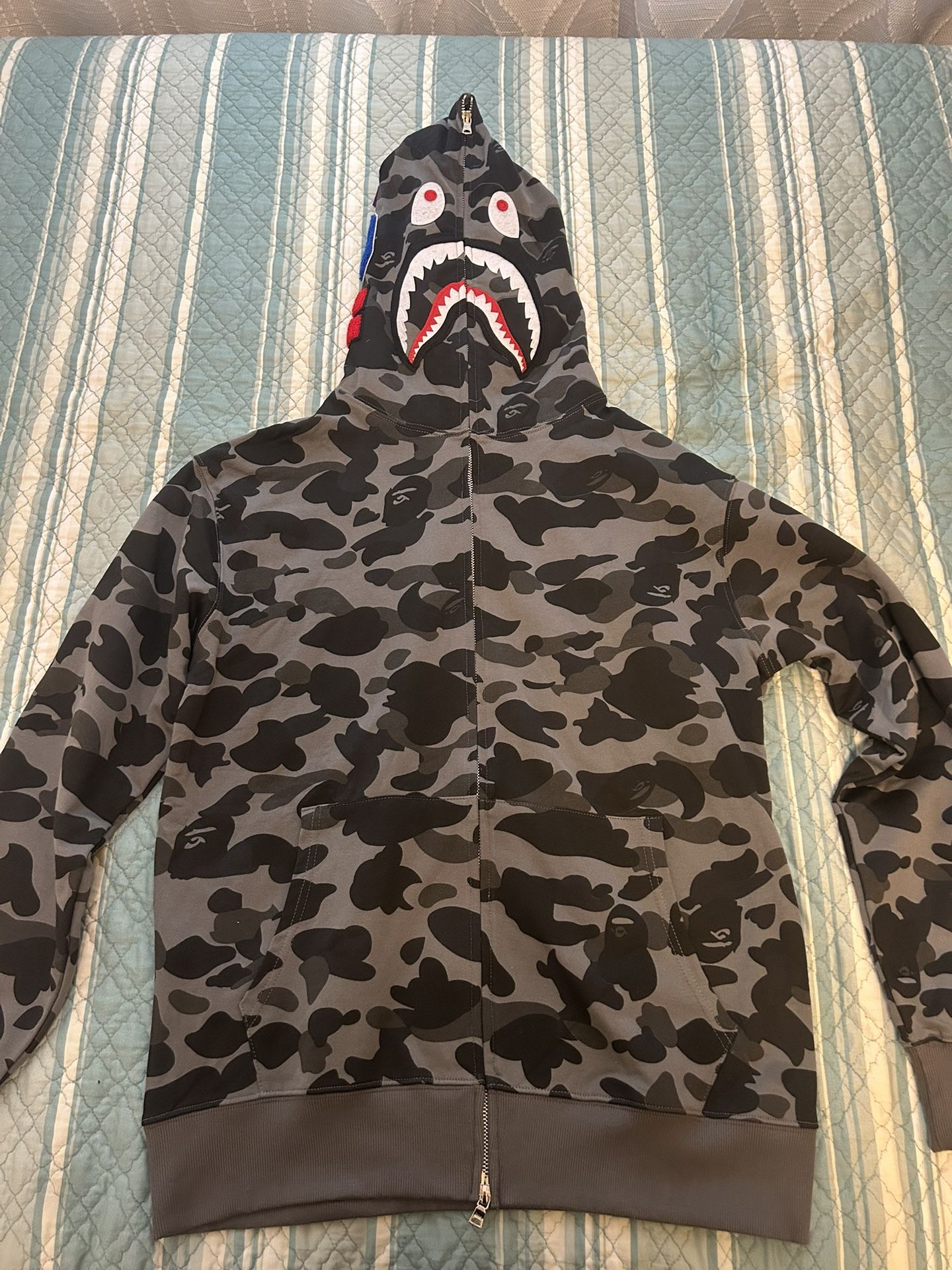 Bape zip up in black and grey