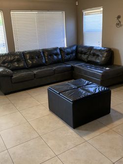 Farely new leather sectional for sale