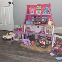 @@@Discontinued @@@Fisher Price loving family dollhouse with a lot of furniture pieces and van