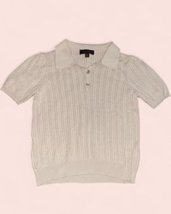 Cream knit polo shirt with button-up collar 