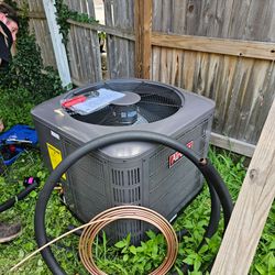 Brand New 2 Ton Air temp Outside AC unit and inside furnace unit LIKE NEW