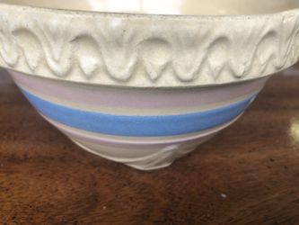 Antique pottery bowl 8 inches across the top