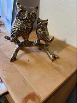 Bronze colored Owl pair