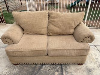 Sofa and loveseat beige with Nailhead Trim
