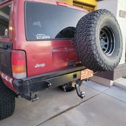 Jeep cherokee xj rear bumper tire carrier