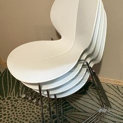 Designer Italian stacking dining chairs