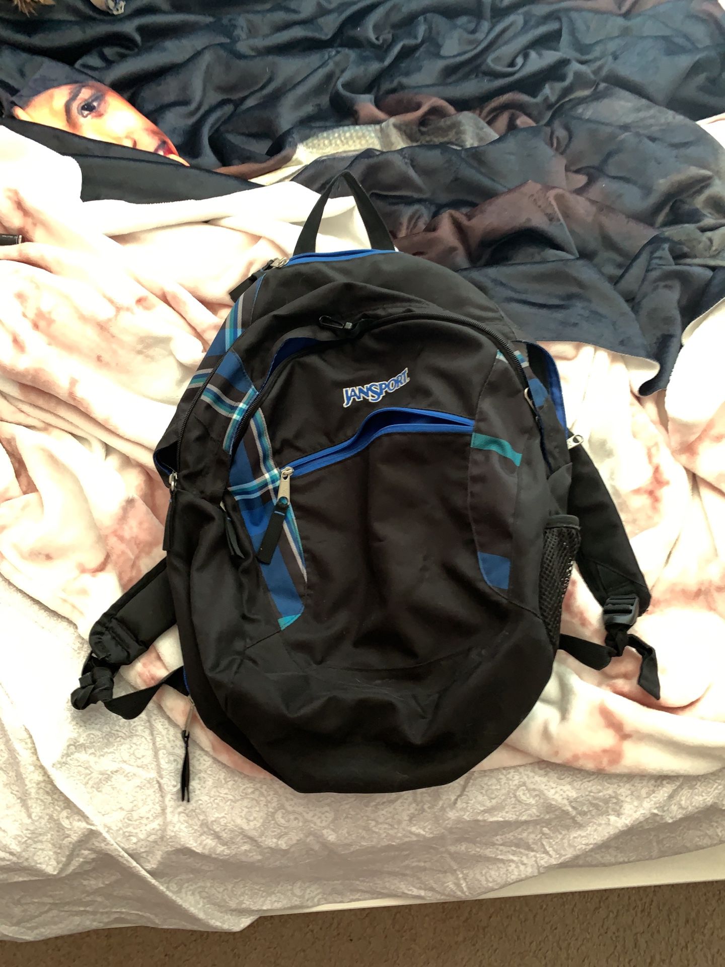 Black and blue jansport backpack