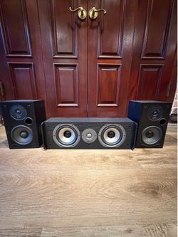 Polk center channel and surround bookshelf speakers