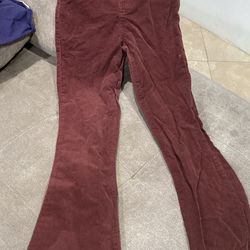 burgundy corduroy flared pants.