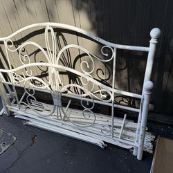 White metal bed frame for double bed. 