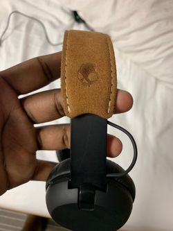 Brown Skullcandy wireless Bluetooth headphones