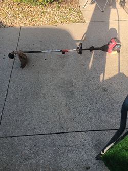 NEW CARBURETOR NEW OIL...TROY-BILT WEED TRIMMER 4 CYCLE NO MIXING GAS! $80 with trade-in or $100. 23 MILE AND CARD MACOMB TWP MICHIGAN