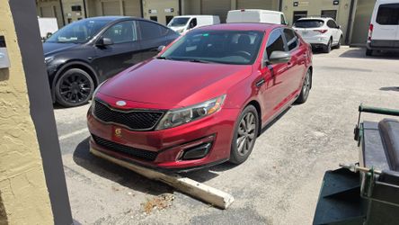 Kia Optima Red 4-Door Sedan