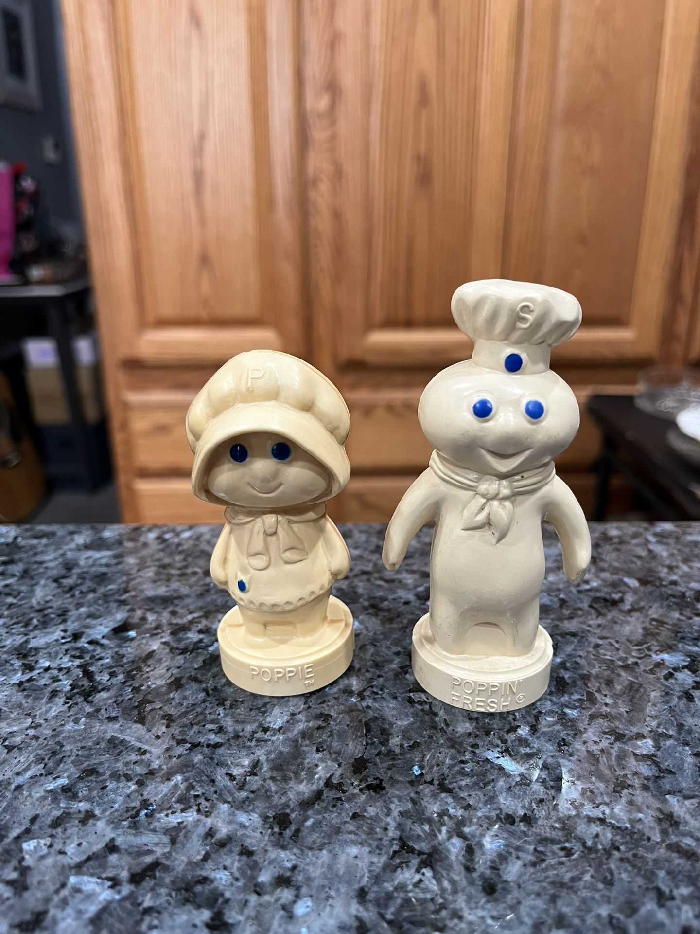 Vintage 1974 Pillsbury Doughboy; Poppin' Fresh & Poppie Pair of Salt and Pepper Shakers. Preowned never used. The girl turned yellow due to age
