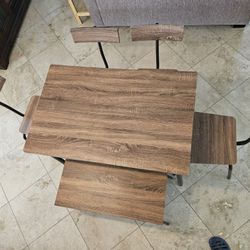 table with 4 chairs and bench
