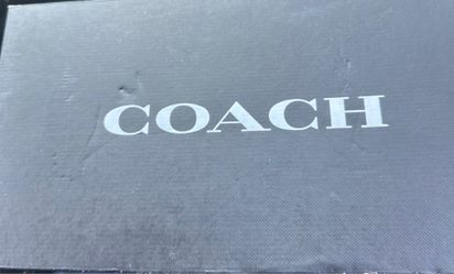 Coach slip ons