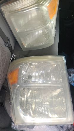 Headlight Lamps Set For Ford F250 F350 F450 And F550 USED no Cracks Or Leaks $50 Firm FIRM IF STILL UP STILL AVAILABLE 