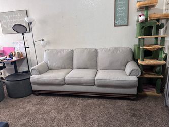 Gray 3-Cushion Sofa with Wood Base