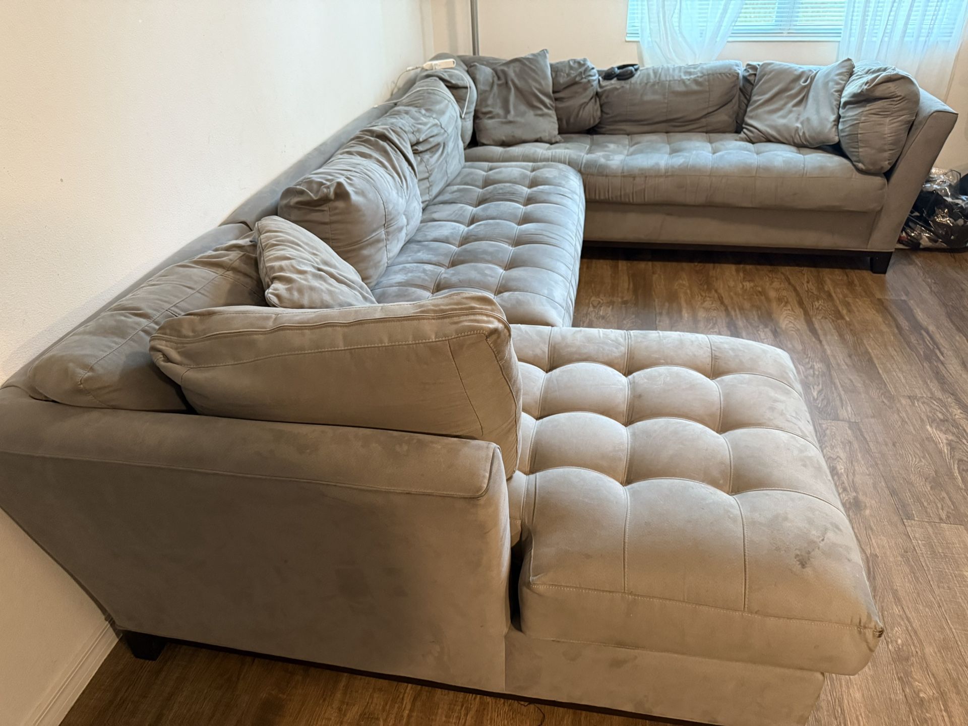 CindyCrawford Sectional sofa from Rooms To Go