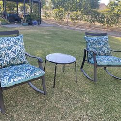 Cast aluminum rocking chairs with table and cushions  IF THE ADD IS UP IT’S AVAILABLE 