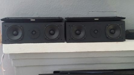 2 Yamaha NS AC 140 center channel Speakers.