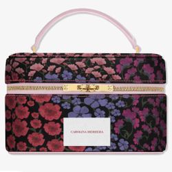 New Carolina Herrera Women’s Cosmetics floral Case Brand new Approx 8.5” x 3.5”