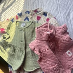 Diaper box filled with baby clothes