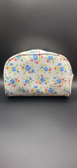 The vintage cosmetics company make up bag