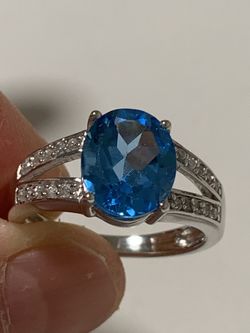 4ct genuine Swiss blue topaz on 925 sterling silver , size 7 and size 8