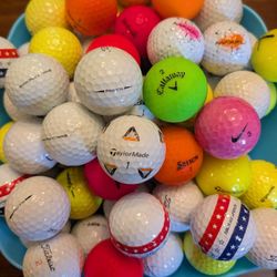 100 GOLF BALLS 