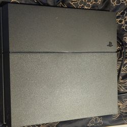 PlayStation 4 Console + Controller + 4 Games