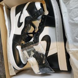 Black and white Jordan 1 high trainers