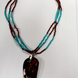 beautiful seed beads necklace in two tones turquoise and dark brown shell  pendant ./ Hermosa Collor De Mostacilla en Dos colores  Azul Turqueza /cafe