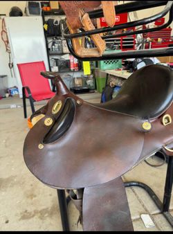 Saddle and riding pad