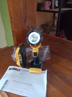 DeWalt 20 v new. LED. Flash Light.   W/ Battery.   2.0 AH Lithium