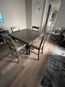 Wooden table with 4 chairs