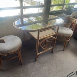 Small rattan table with two chairs