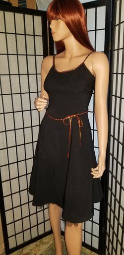 Black retro dress with orange ribbon bow