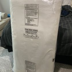 Toddler bed WITH unwrapped Mattress