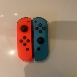Blue And Green Nintendo Switch Joycons 