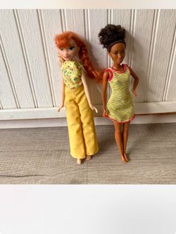 Frozen and Barbie dolls