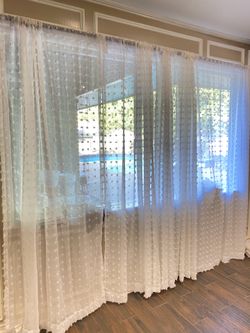 Gently used Beautiful Sheer White Curtains