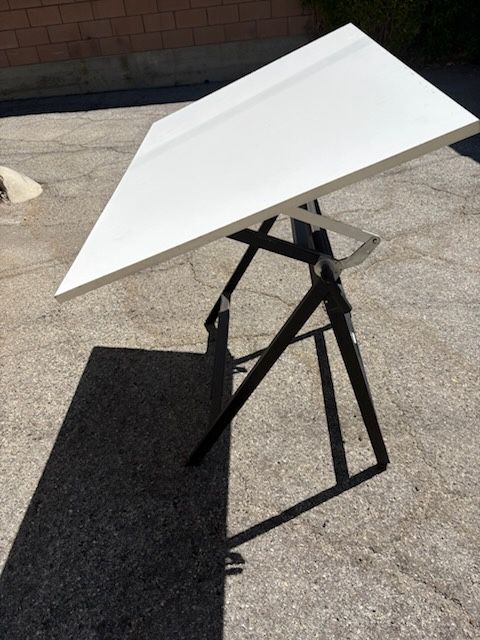 Vintage 1990’s Neolt drafting table 48” x 31 1/2” x 3/4” Adjusts to various heights and angles. Suggest Vyco Drafting table cover to preserve tablet