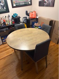 Dinner Table with three chairs