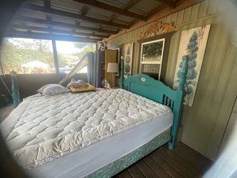 Vintage wooden four post bed. Double size
