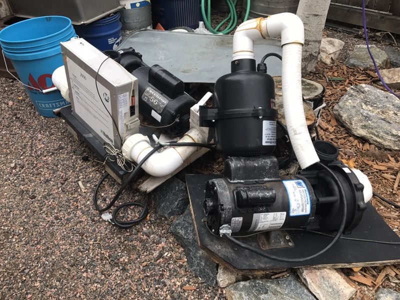 Hot tub pumps and cover