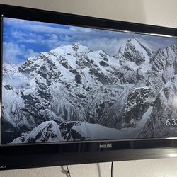 42 Inch Phillips TV With Wall Stand And Universal Controller