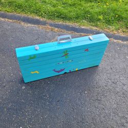 A Kids Table That Folds Into A Suit Case