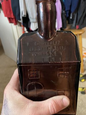 Photo Vintage E. G. Booz's Old Cabin Whiskey Bottle