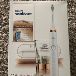 BRAND NEW PHILIPS ELECTRIC TOOTHBRUSH